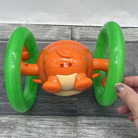 Bright Starts Roll & Glow Monkey Toy with Lights and Melodies, Ages 6M+ {1} - Picture 6 of 9